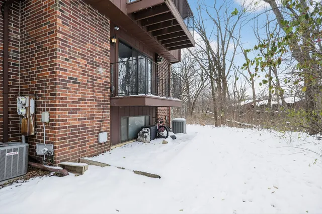 a backyard of a house with large trees