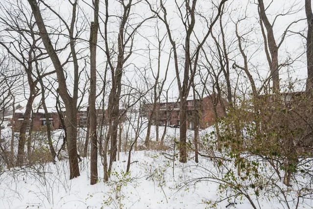 a view of a wooden fence from a balcony