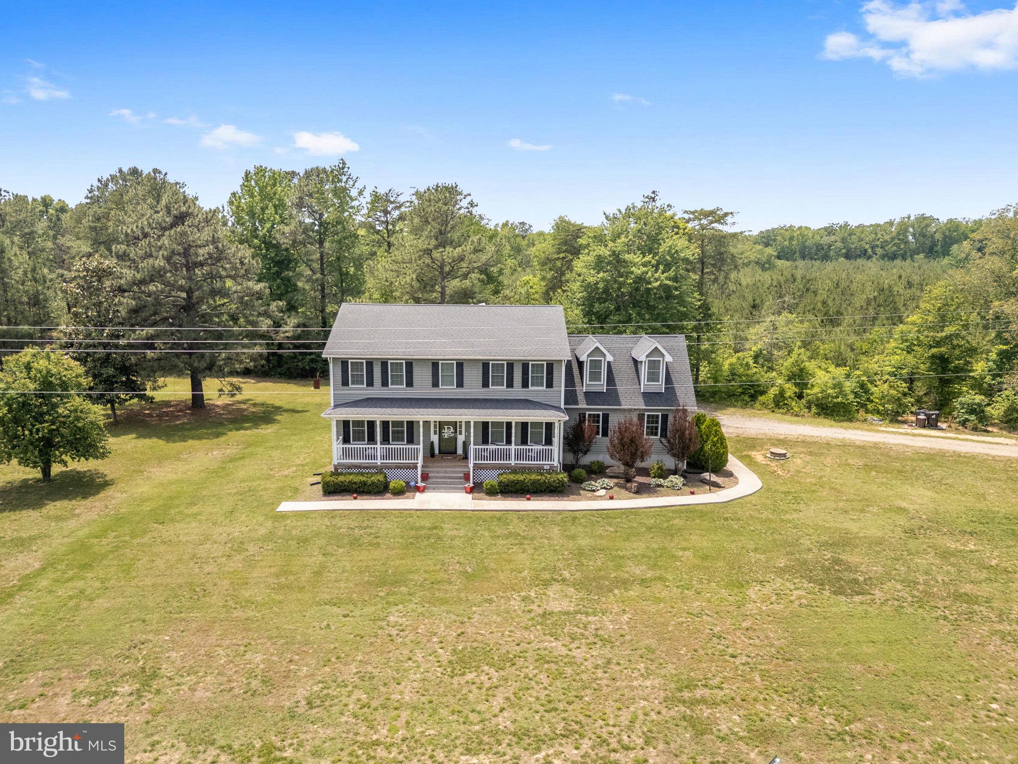 22088 Landora Bridge Road Ruther Glen, VA 22546 - Photo 13 of 122 Charming home nestled in nature's embrace.