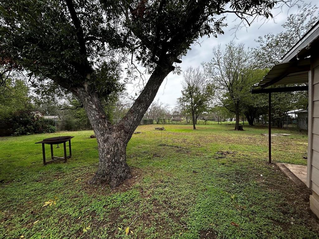 910 West Long, Unit A Stephenville, TX 76401 - Photo 17 of 39 a view of outdoor space with a garden