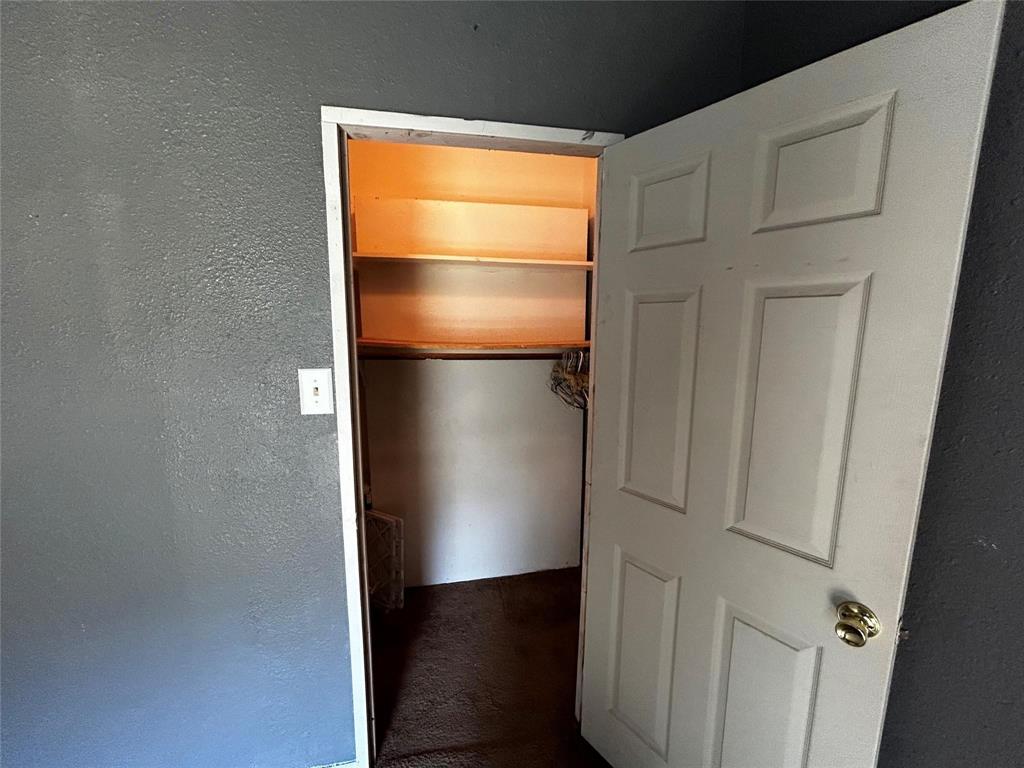 910 West Long, Unit A Stephenville, TX 76401 - Photo 34 of 39 a room with a door