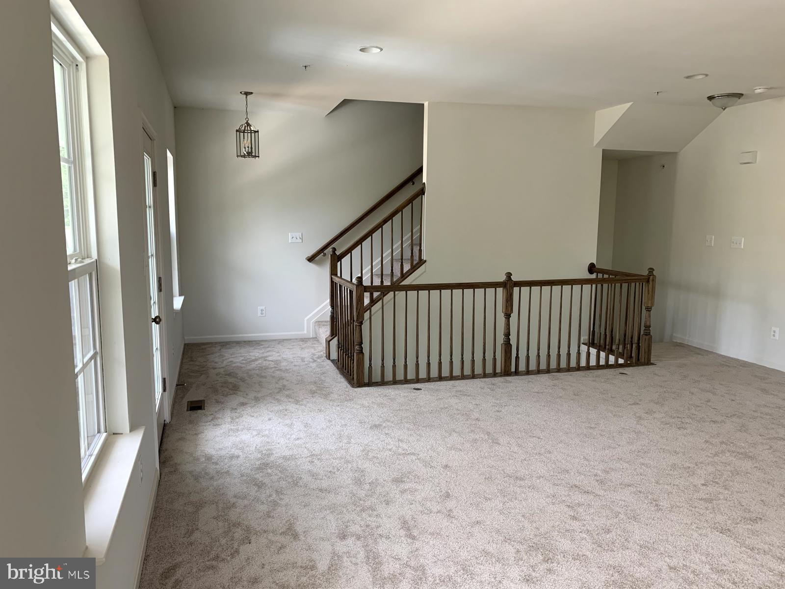 263 Trails Way Joppa, MD 21085 - Photo 8 of 27 a view of a hallway with staircase