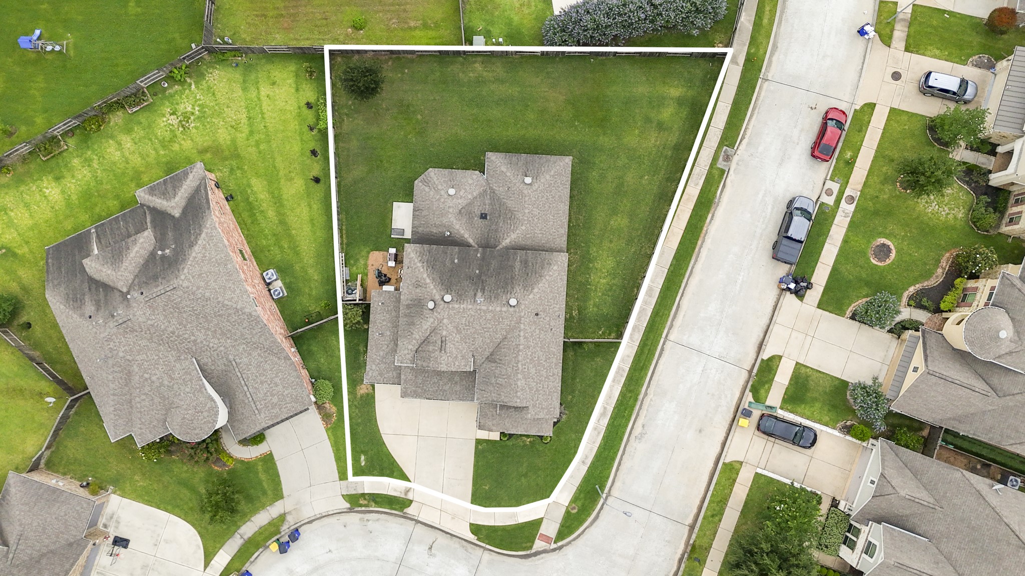 7502 Windsor Park Court Spring, TX 77379 - Photo 43 of 50 From above, the oversized corner lot really comes into focus, showing how the home is positioned with extra yard space wrapping around the side and back — a rare amount of room for a neighborhood setting like this.