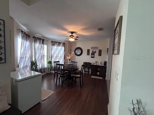 a view of a livingroom with furniture and window