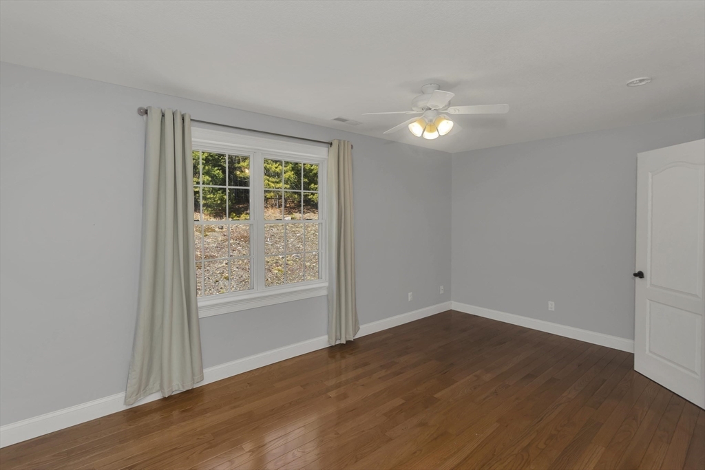 333 Stebbins Street Belchertown, MA 01007 - Photo 25 of 42 wooden floor in an empty room with a window