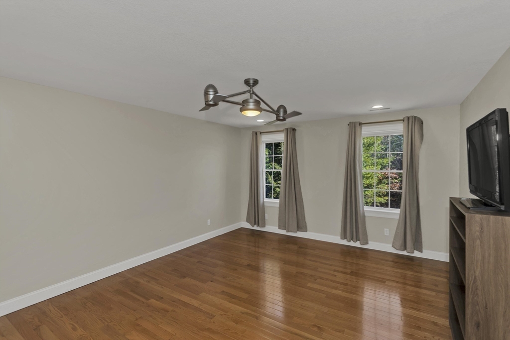 333 Stebbins Street Belchertown, MA 01007 - Photo 30 of 42 a view of a livingroom with wooden floor and a window