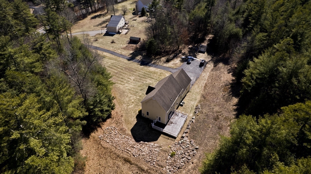 333 Stebbins Street Belchertown, MA 01007 - Photo 40 of 42 a view of a house with a yard
