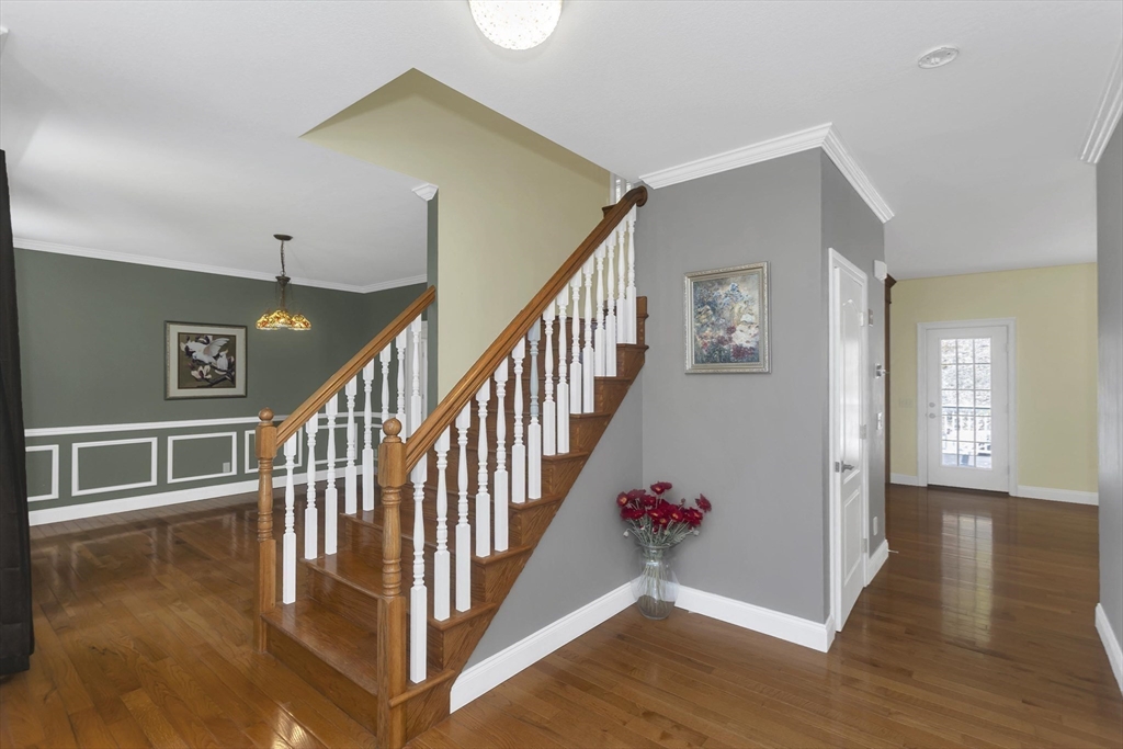 333 Stebbins Street Belchertown, MA 01007 - Photo 5 of 42 a view of entryway and hall with wooden floor