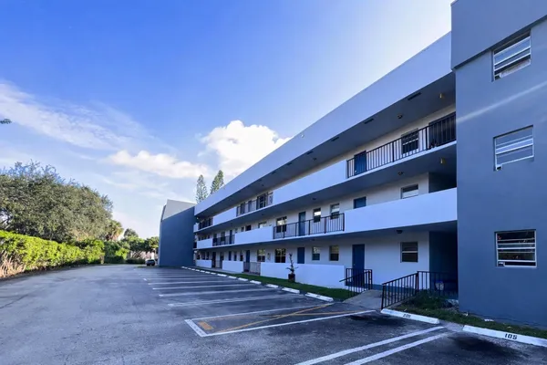 a view of a building with a street