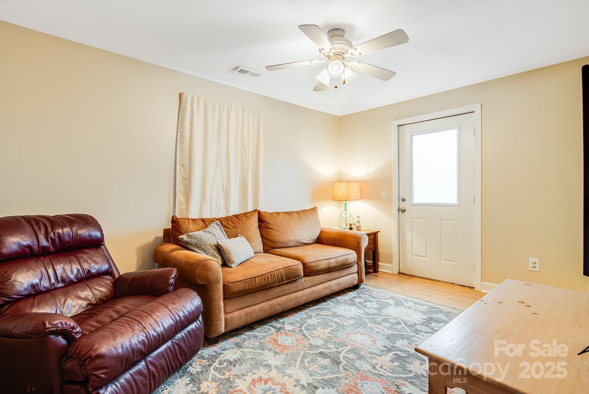 195 Whitmire Road Brevard, NC 28712 - Photo 14 of 30 a living room with furniture and a couch