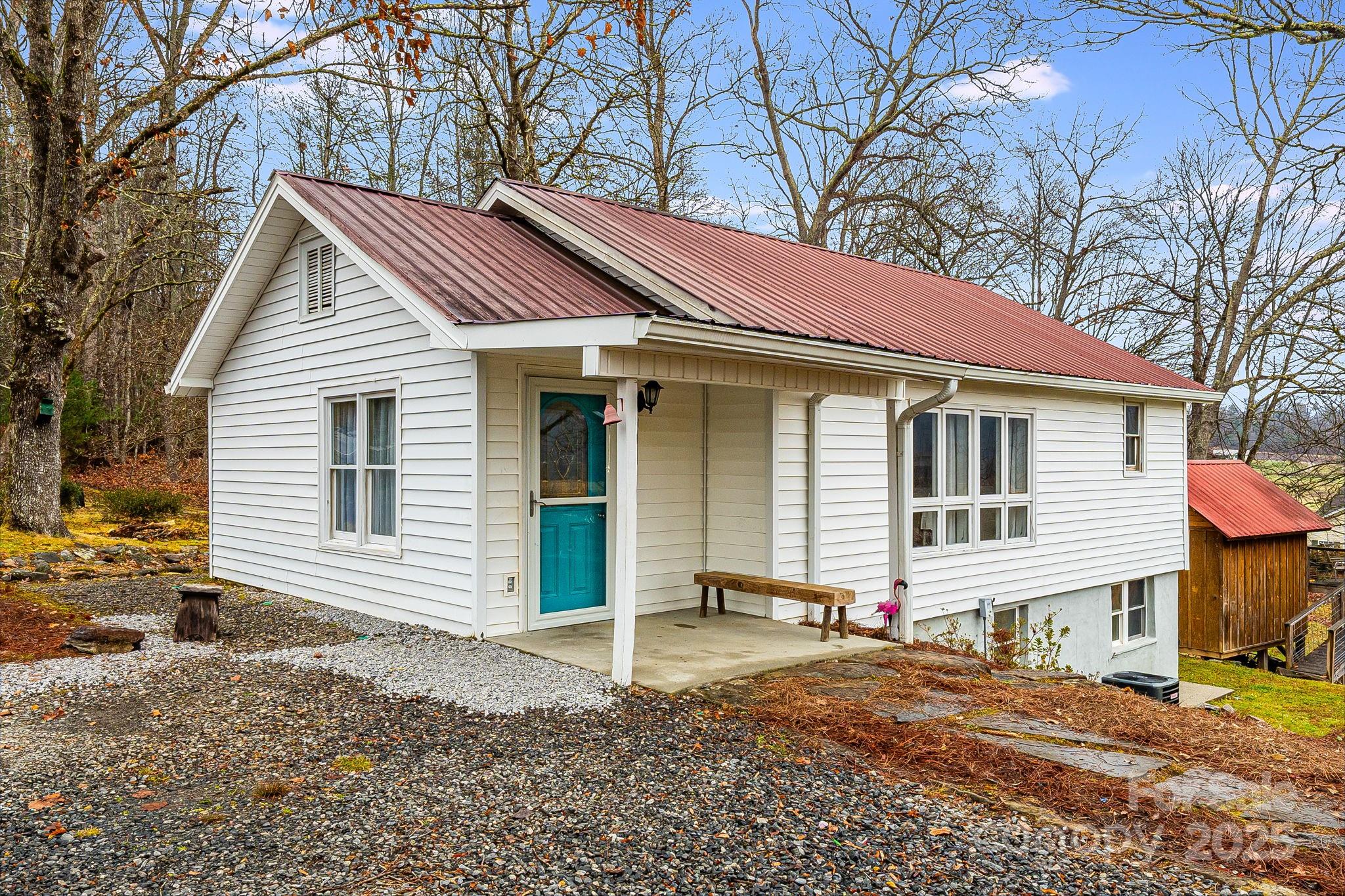 195 Whitmire Road Brevard, NC 28712 - Photo 2 of 30 a view of a house with a yard
