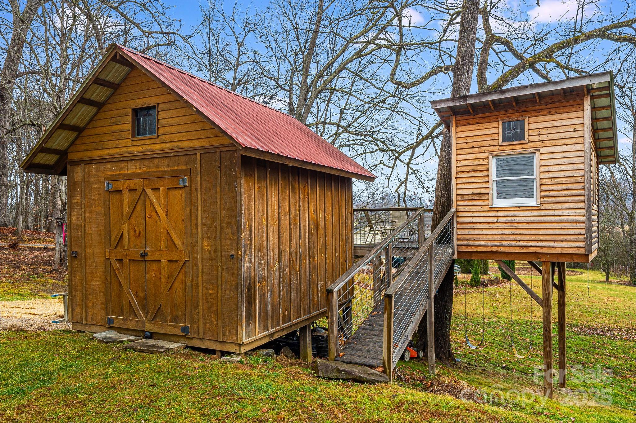 195 Whitmire Road Brevard, NC 28712 - Photo 26 of 30 a view of backyard with cabin