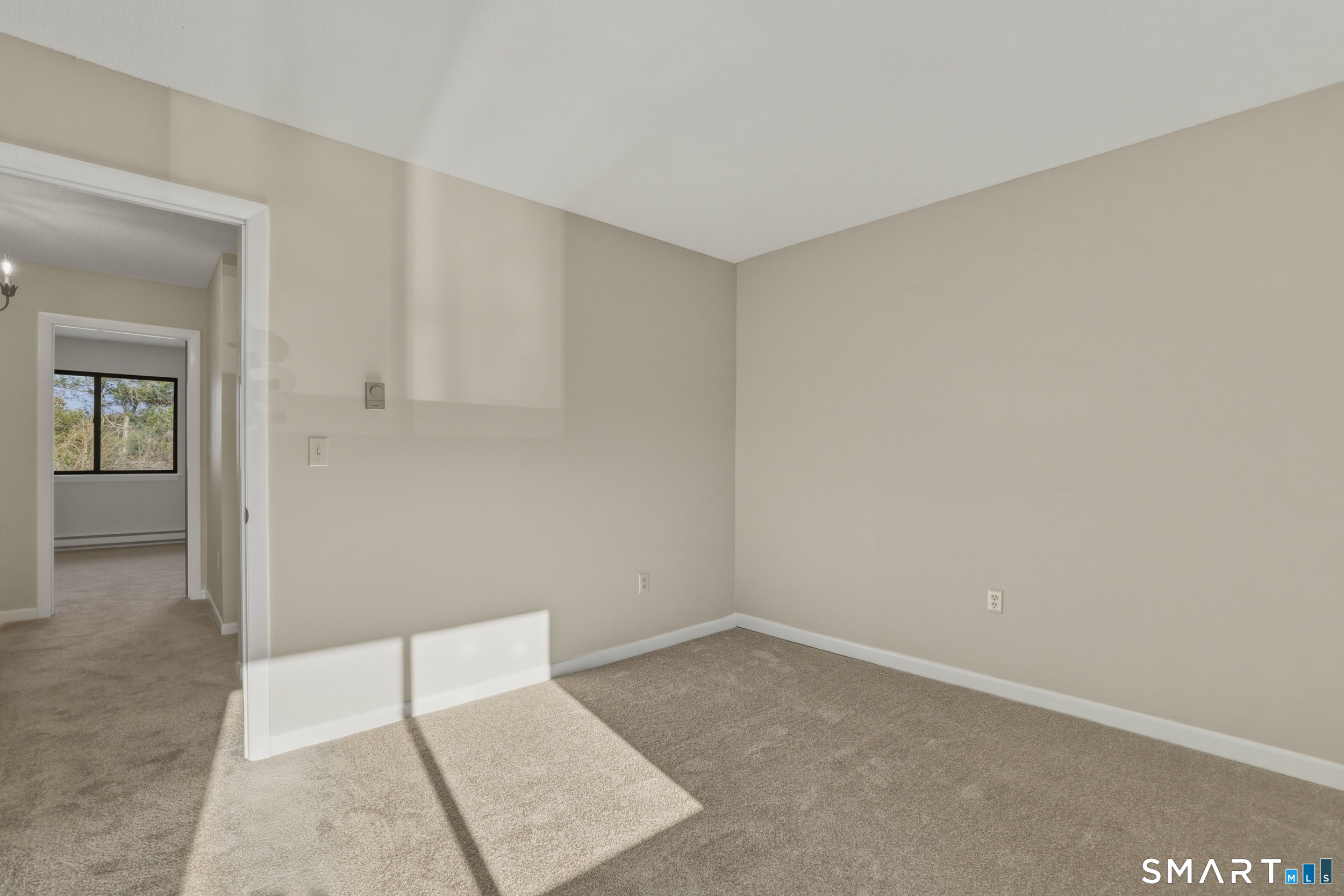412 South Main Street, Unit 15 Plymouth, CT 06786 - Photo 17 of 28 wooden floor in an empty room