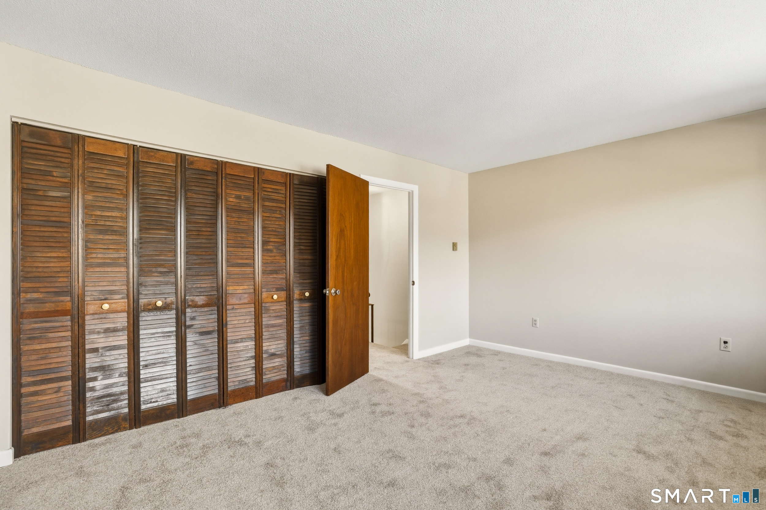 412 South Main Street, Unit 15 Plymouth, CT 06786 - Photo 20 of 28 en empty room with windows