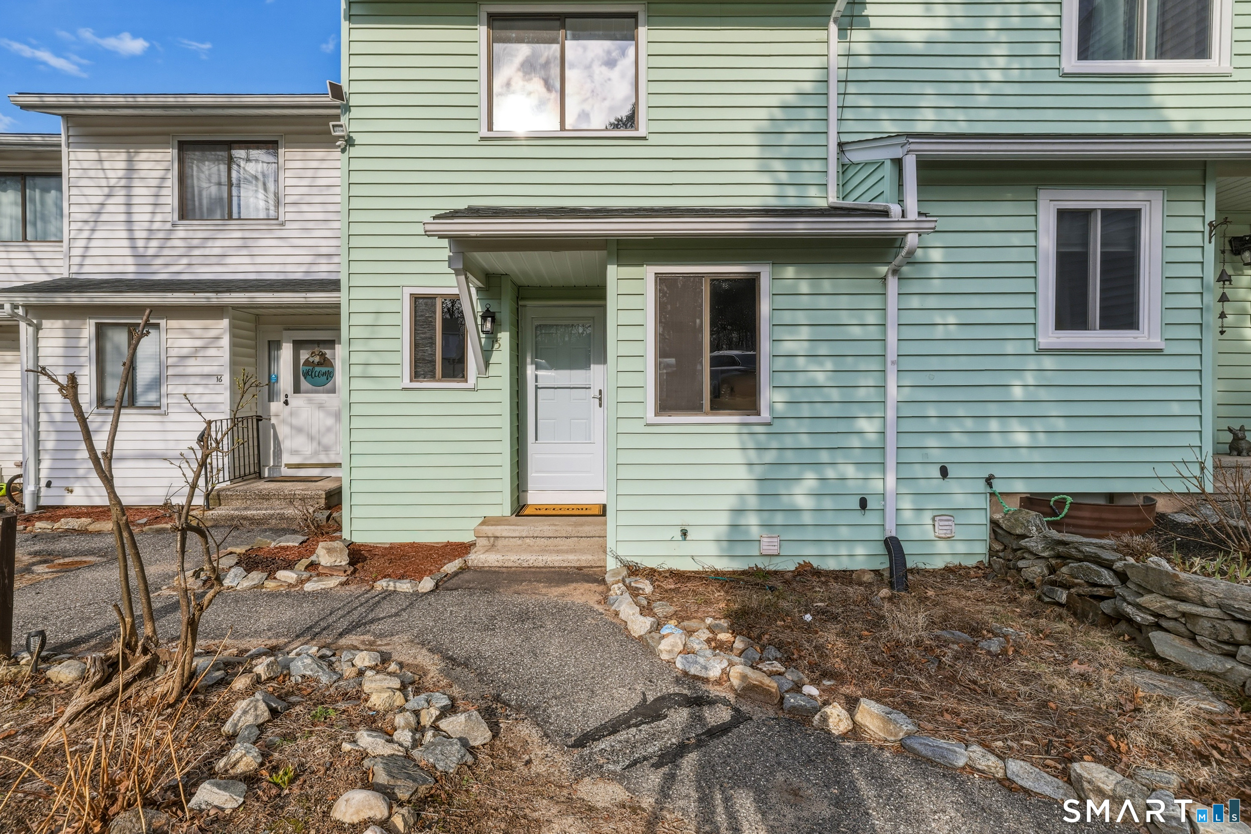 412 South Main Street, Unit 15 Plymouth, CT 06786 - Photo 3 of 28 a view of a house with a yard and sitting space