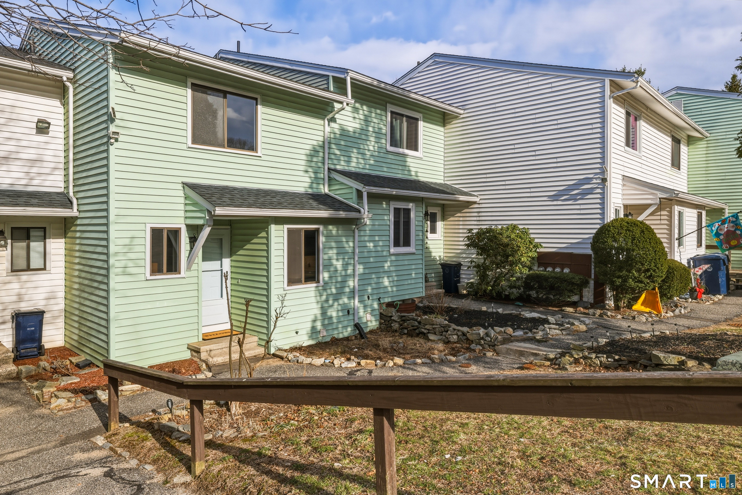 412 South Main Street, Unit 15 Plymouth, CT 06786 - Photo 4 of 28 a front view of a house with porch