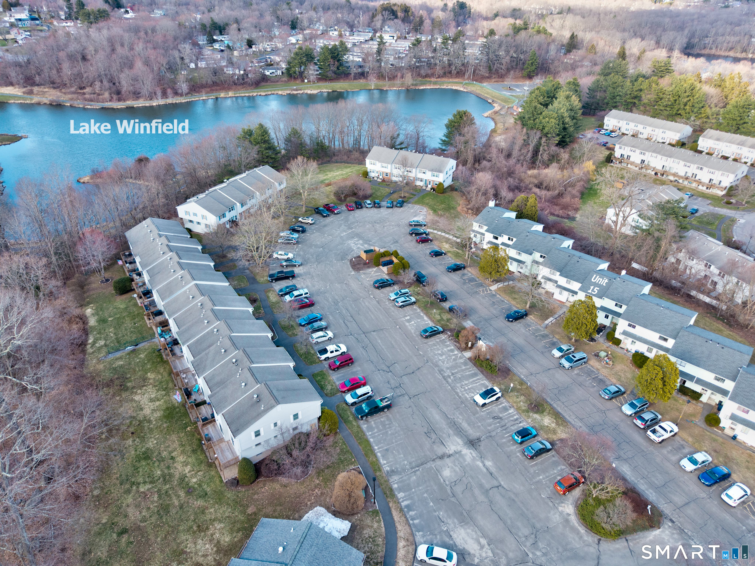412 South Main Street, Unit 15 Plymouth, CT 06786 - Photo 6 of 28 an aerial view of a house a yard swimming pool and outdoor seating