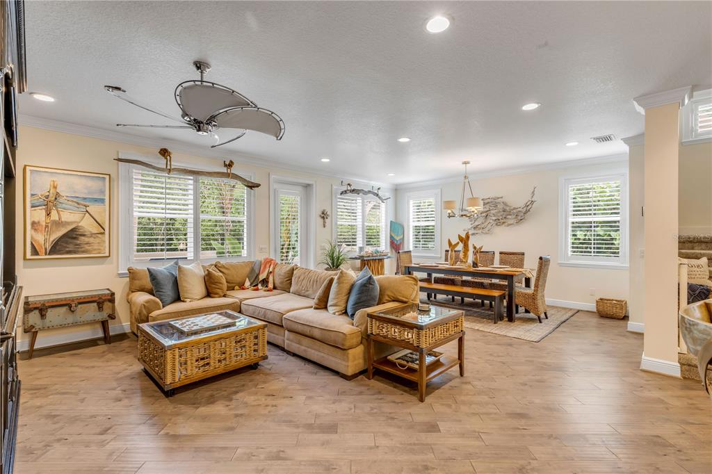 123 Marina Bay Drive New Smyrna Beach, FL 32169 - Photo 18 of 84 a living room with furniture and a large window
