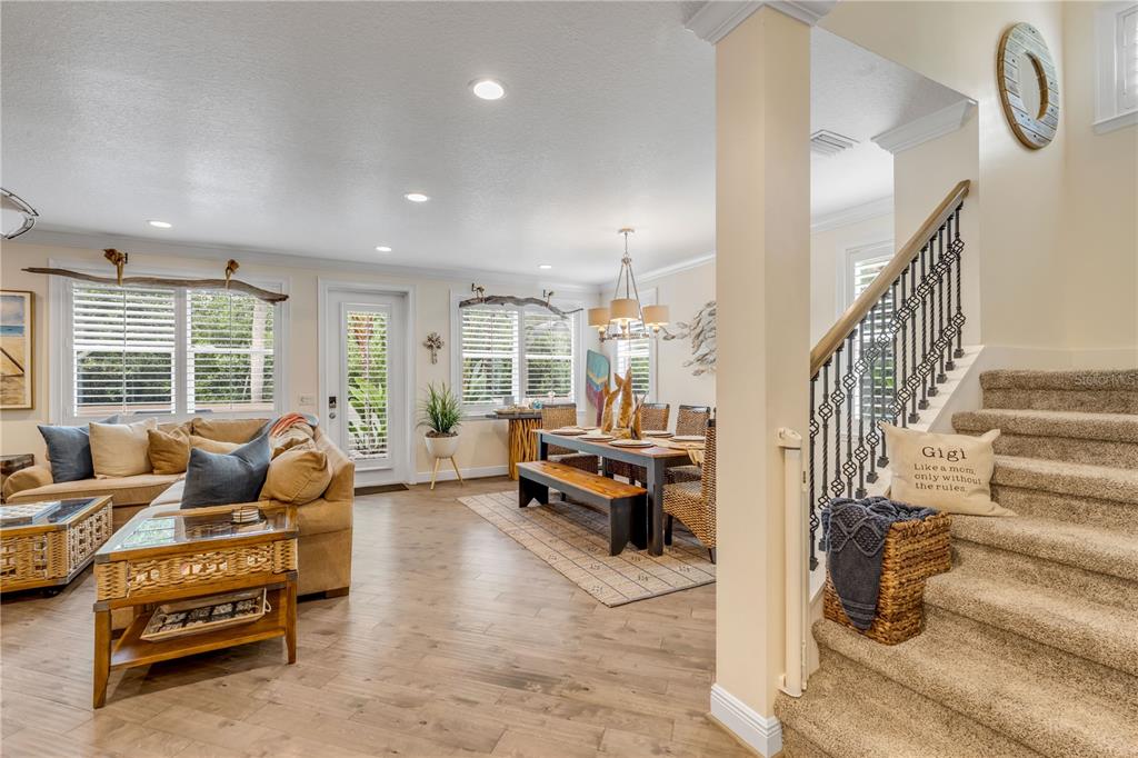 123 Marina Bay Drive New Smyrna Beach, FL 32169 - Photo 32 of 84 a living room with furniture and a large window
