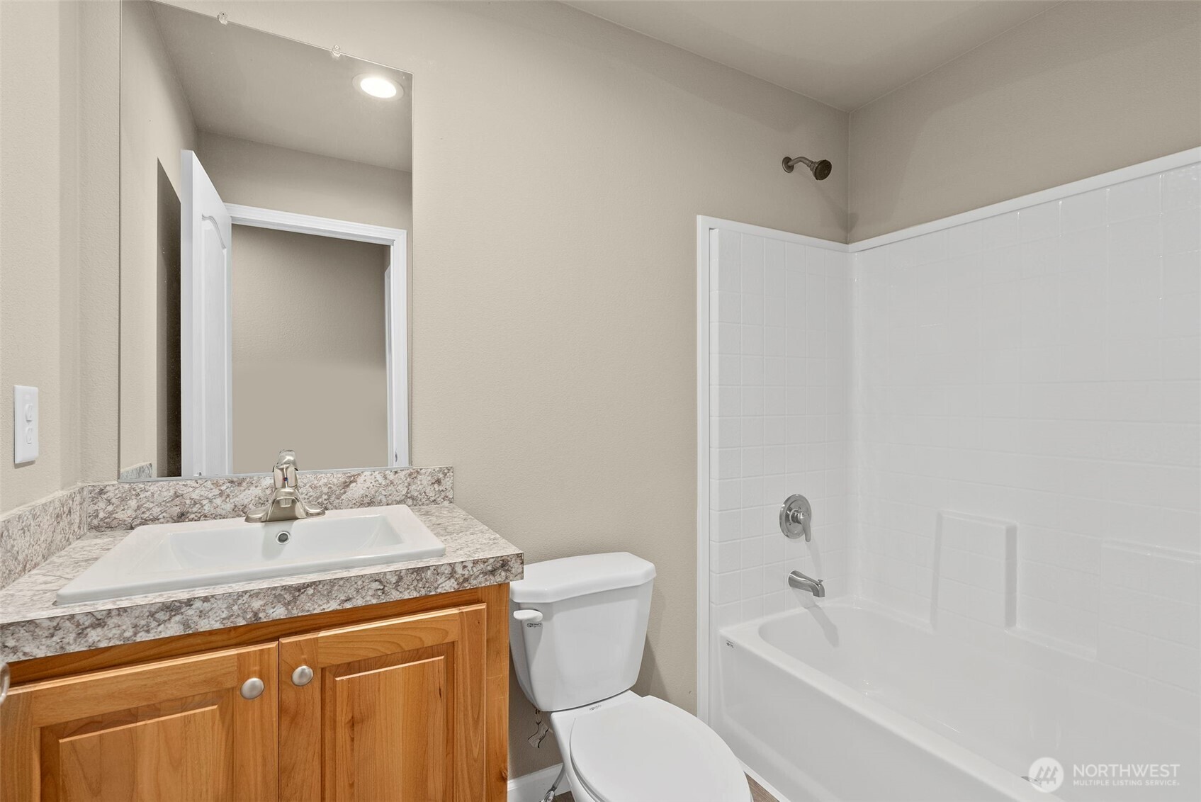 141 East Dalkeith Road Shelton, WA 98584 - Photo 21 of 38 a bathroom with a granite countertop sink toilet and shower