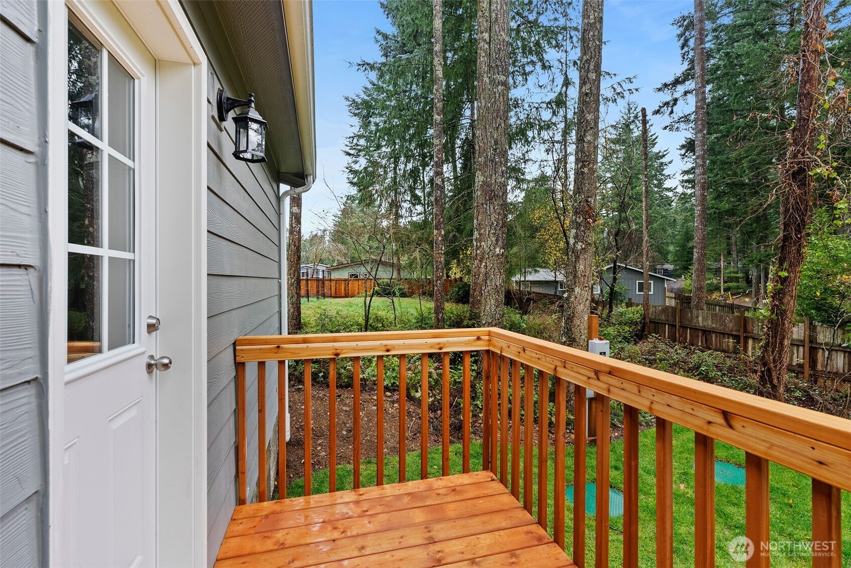 141 East Dalkeith Road Shelton, WA 98584 - Photo 27 of 38 a view of a deck with a yard