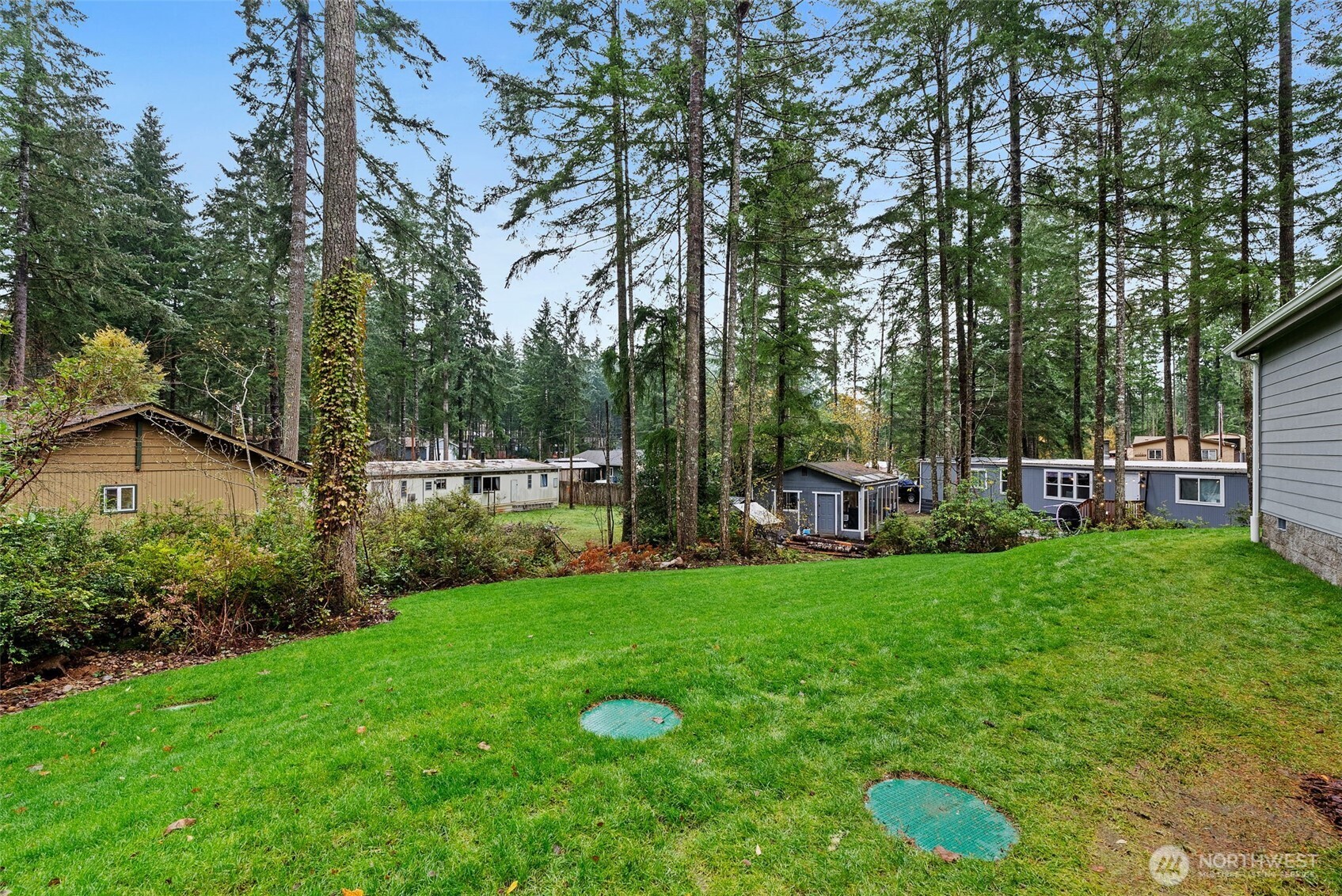 141 East Dalkeith Road Shelton, WA 98584 - Photo 29 of 38 a view of a backyard with sitting area