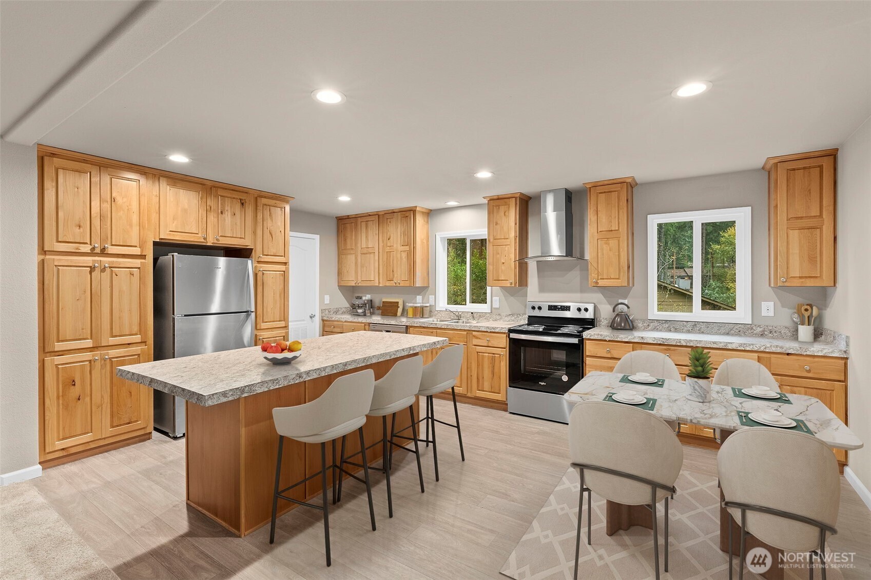 141 East Dalkeith Road Shelton, WA 98584 - Photo 8 of 38 a kitchen with stainless steel appliances granite countertop a stove a sink a refrigerator and a dining table