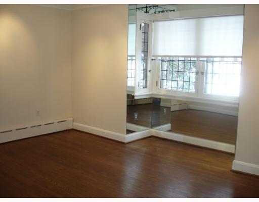 971 Wellesley Road Highland Park, PA 15206 - Photo 2 of 8 Living Room. *****AFTER****Newly painted Living Room with hardwood floors and leaded glass windows