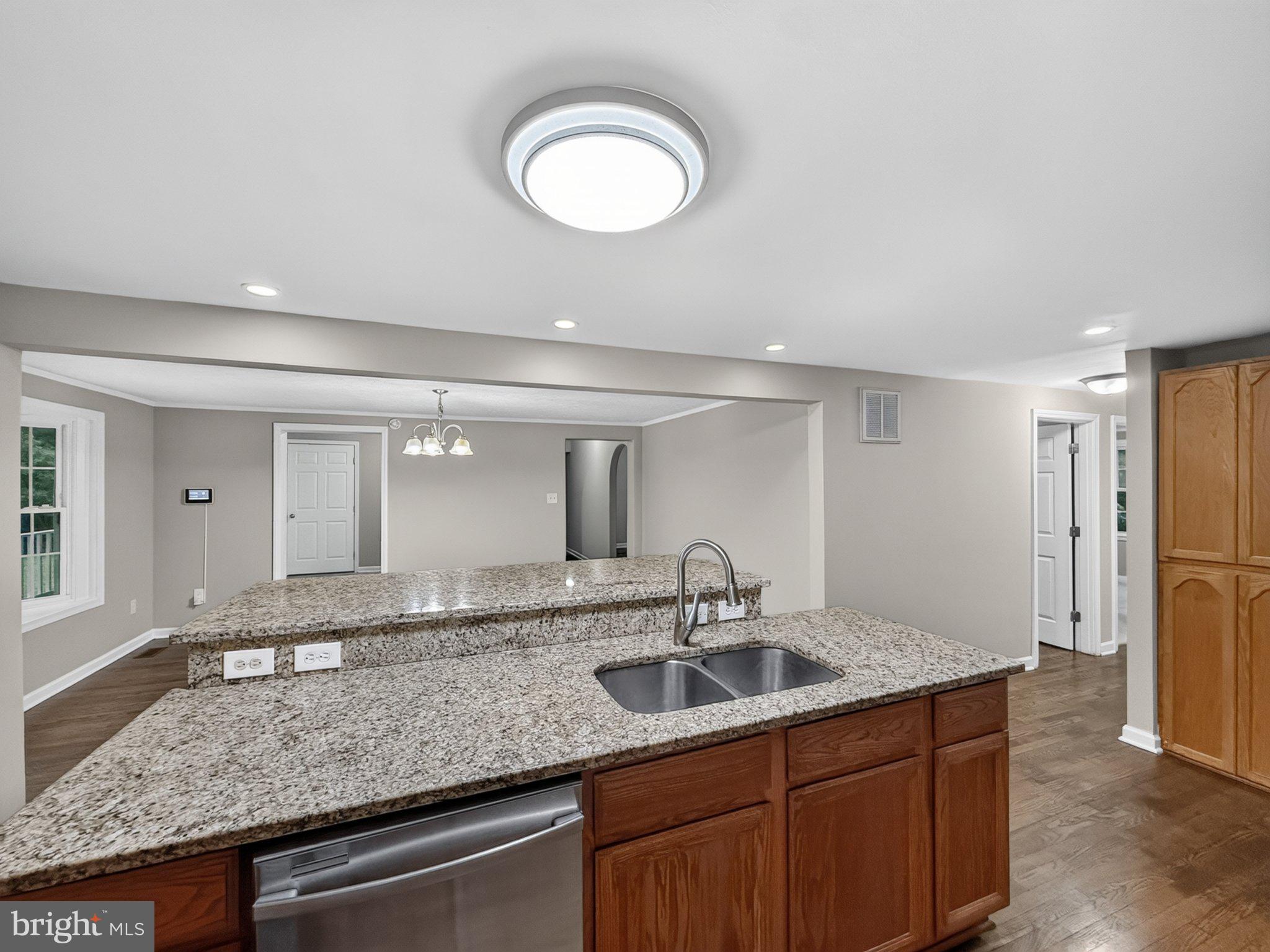 6117 Towles Mill Road Partlow, VA 22534 - Photo 15 of 30 Modern kitchen with sleek finishes.