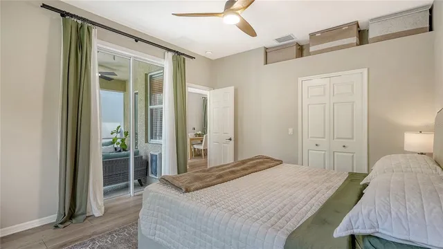 a bedroom with a bed and a walk in closet