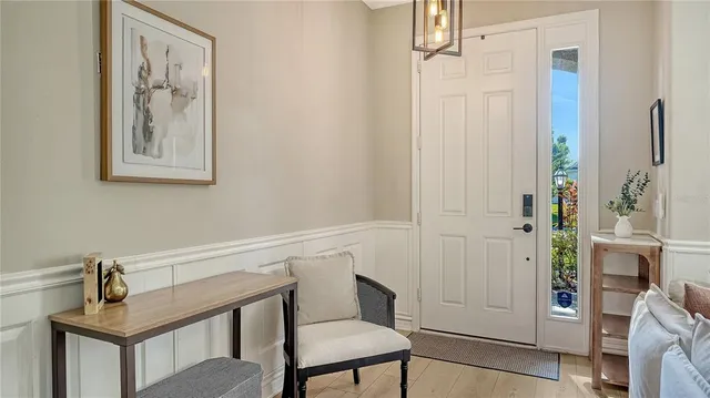 a view of a hallway with seating area