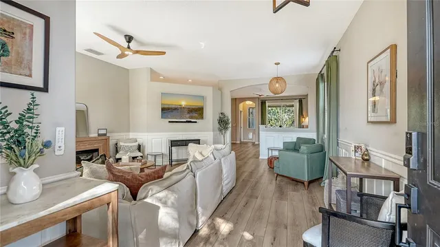 a living room with furniture and a window