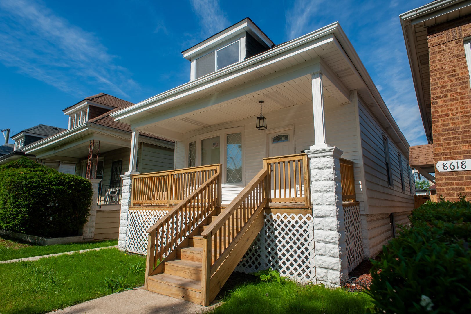8620 South Union Avenue Chicago, IL 60620 - Photo 2 of 41 front view of a house with a yard