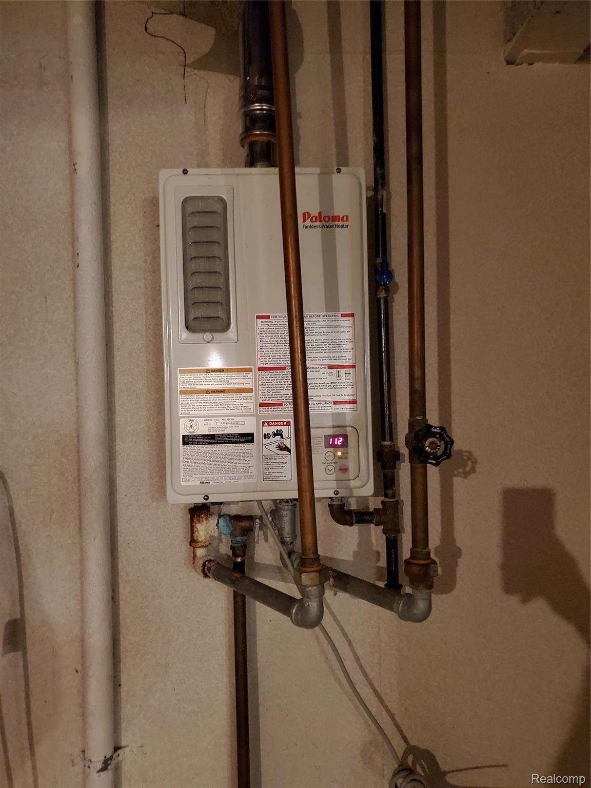 3570 East Coon Lake Road Howell, MI 48843 - Photo 42 of 45 NEWER HOT WATER ON-DEMAND SYSTEM