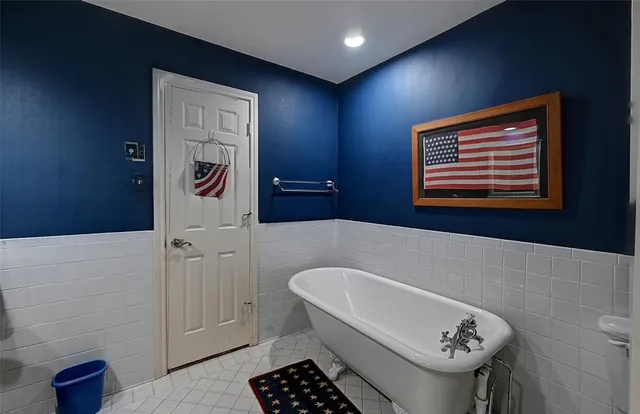 a bathroom with a sink and a bathtub