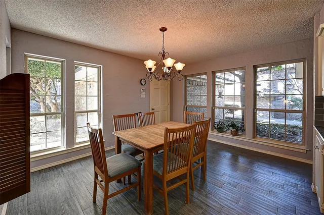 a dining room with furniture window wooden floor