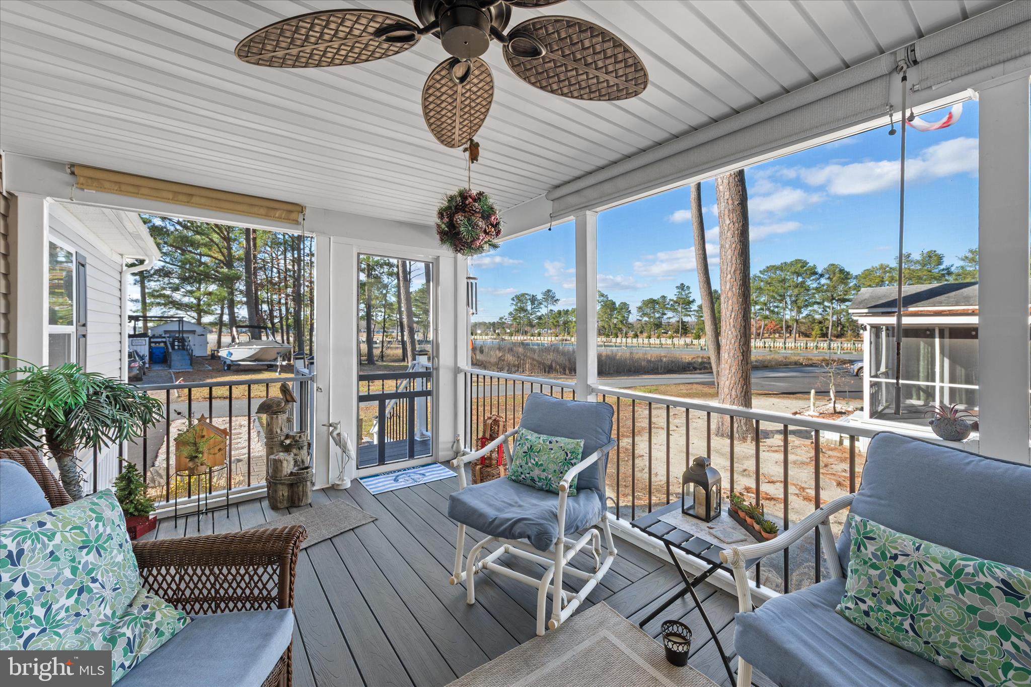 a balcony with furniture and garden view