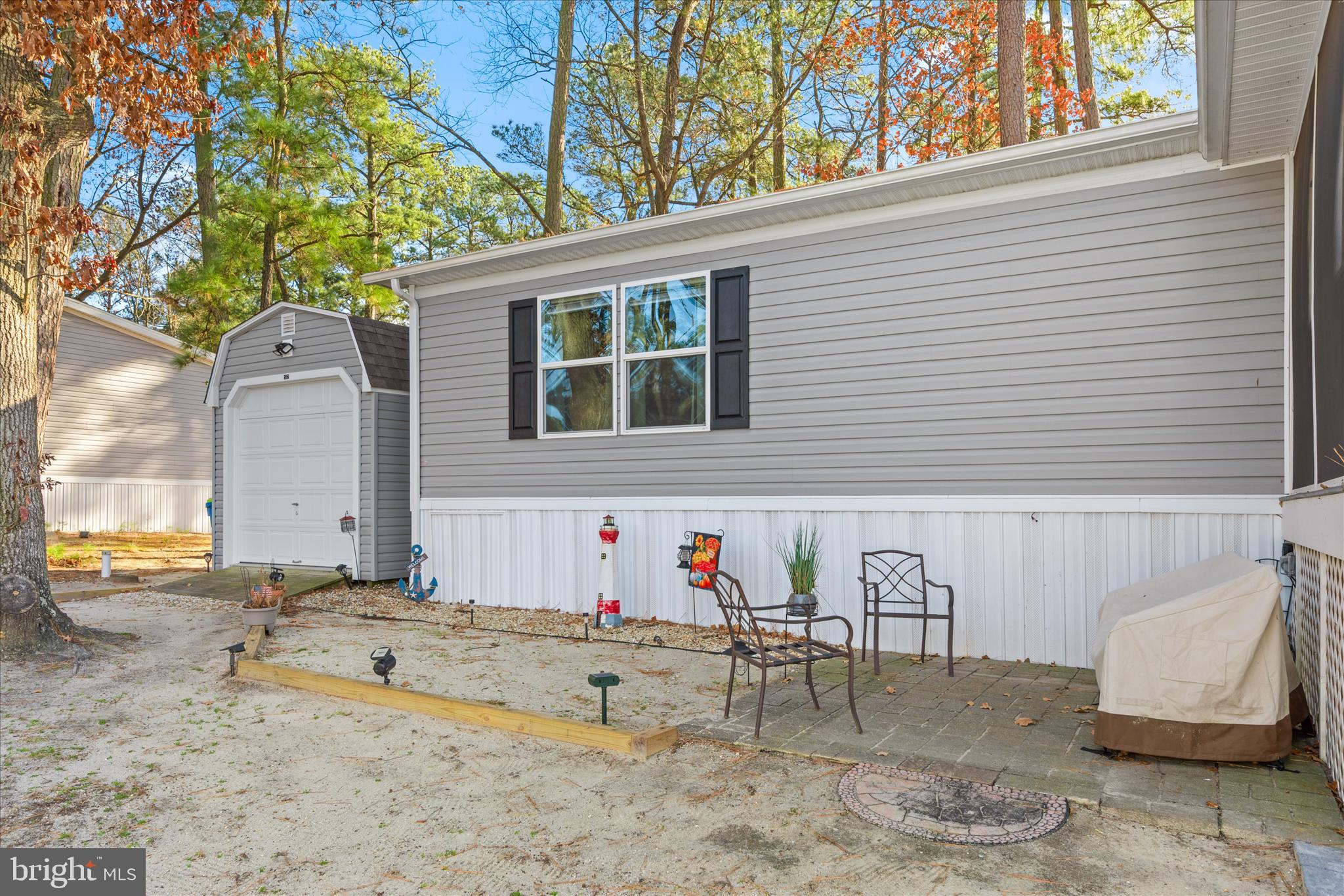 27297 Waters Edge Road Millsboro, DE 19966 - Photo 25 of 46 an outdoor view with patio
