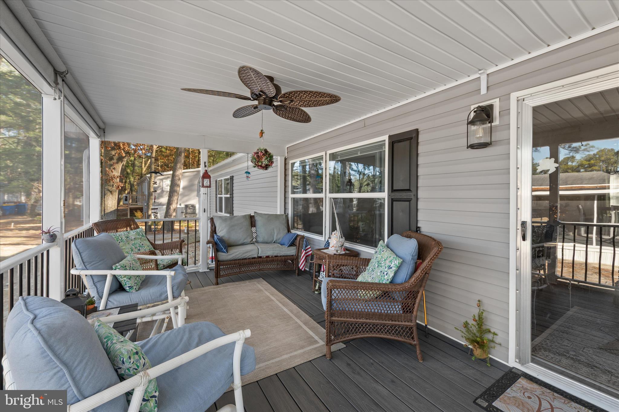 27297 Waters Edge Road Millsboro, DE 19966 - Photo 4 of 46 a outdoor living space with furniture
