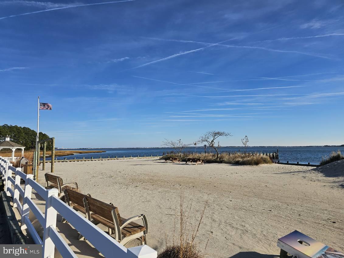 27297 Waters Edge Road Millsboro, DE 19966 - Photo 44 of 46 a view of an ocean and beach
