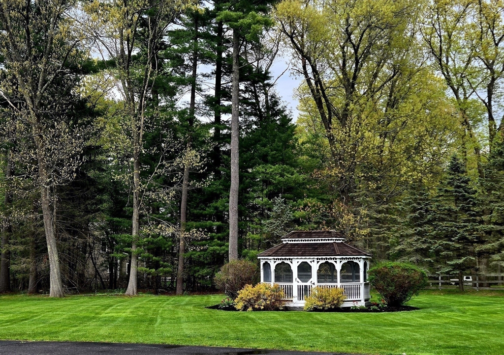 28 Pineswamp Road Ipswich, MA 01938 - Photo 6 of 42 a front view of a house with a yard