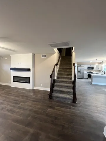 an empty room with wooden door