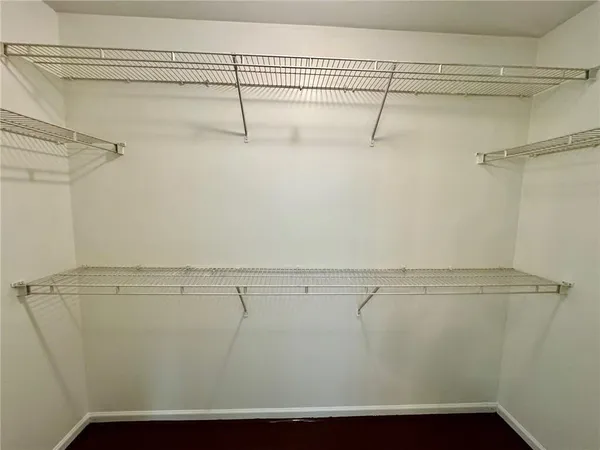 a view of a room with racks on the wall
