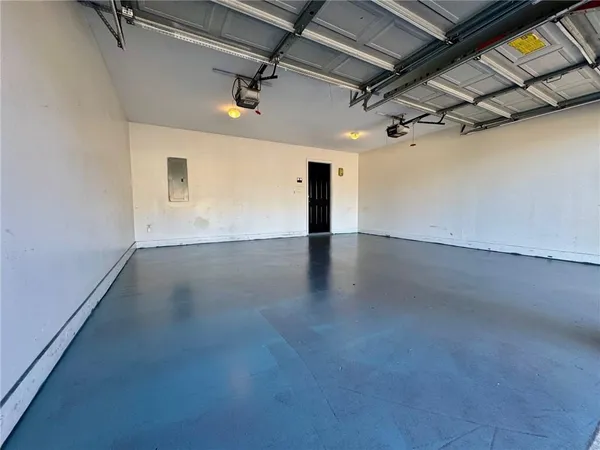 an empty room with wooden floor