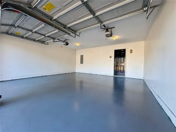 an empty room with wooden floor