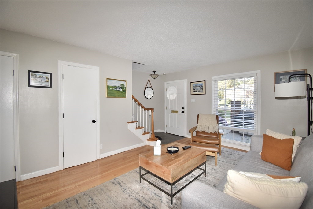 15 Yorktown Drive, Unit 15 Springfield, MA 01108 - Photo 4 of 22 a living room with furniture rug and window