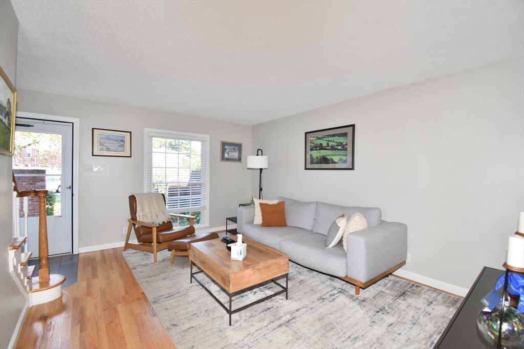 15 Yorktown Drive, Unit 15 Springfield, MA 01108 - Photo 5 of 22 a living room with furniture and a window