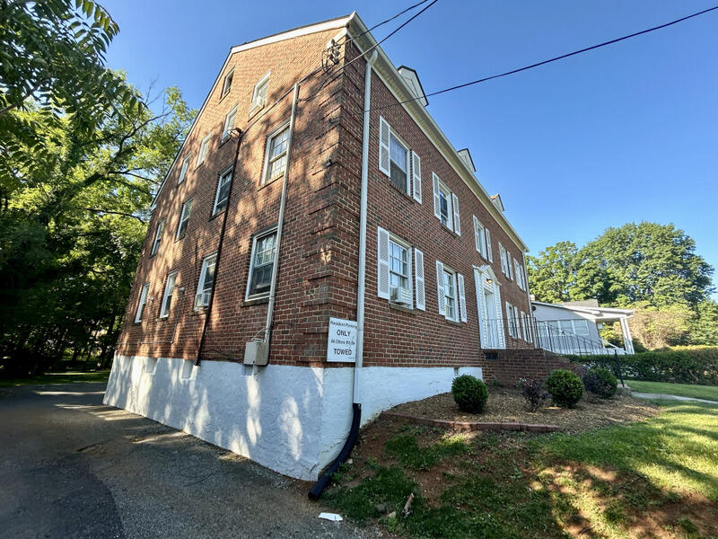 2703 Broad Street Northwest, Unit 6 Roanoke, VA 24012 - Photo 3 of 19 a view of a building with a yard