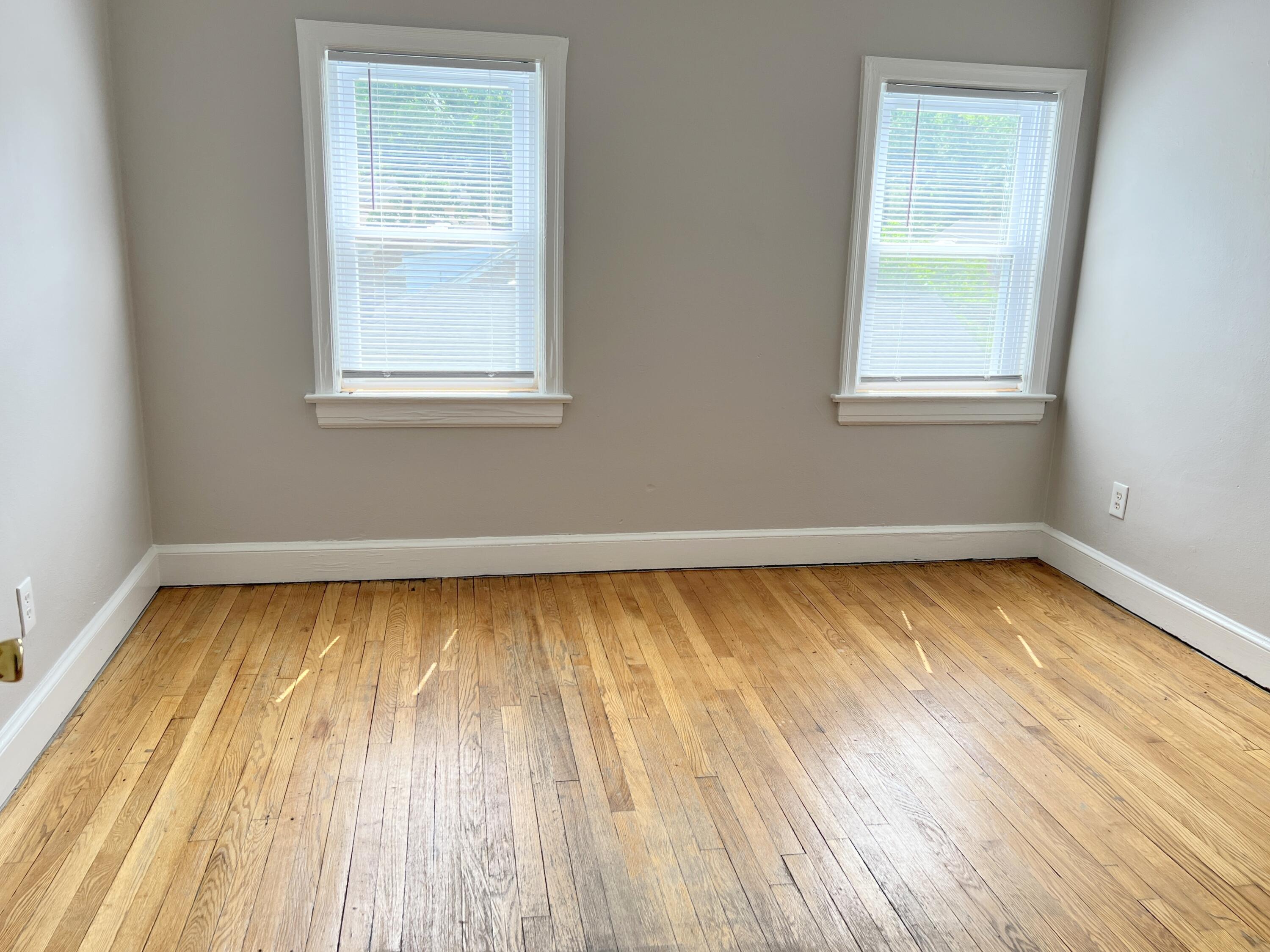 2703 Broad Street Northwest, Unit 6 Roanoke, VA 24012 - Photo 9 of 19 a view of a room with wooden floor and window