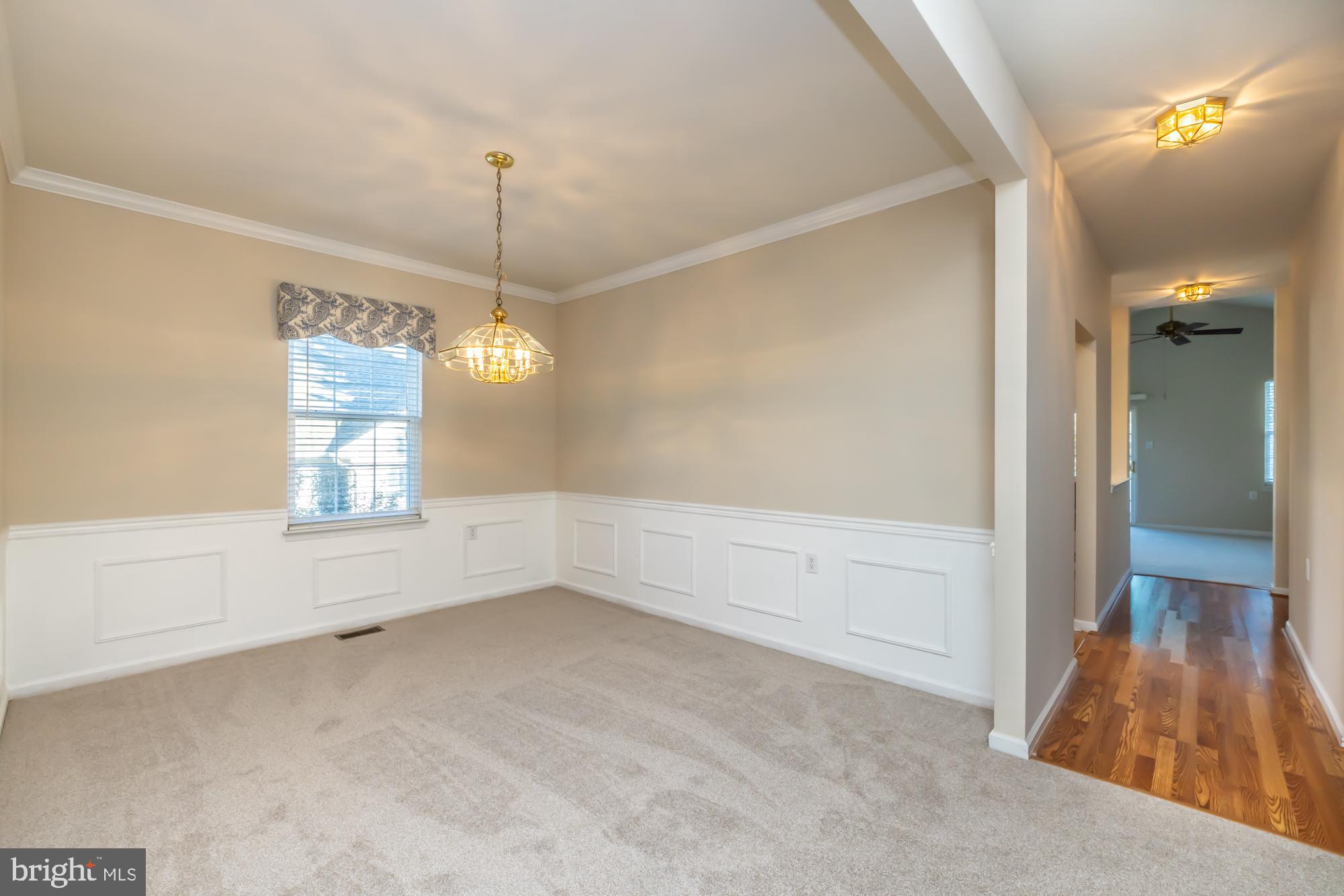 209 Kendig Road Coatesville, PA 19320 - Photo 12 of 47 a view of an empty room with window and cabinet